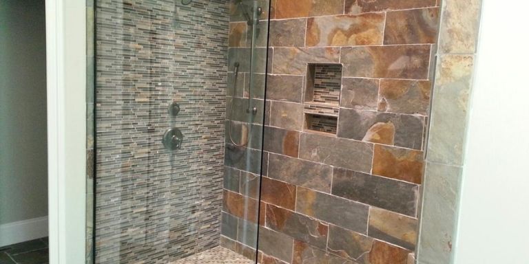 clean stone tile shower