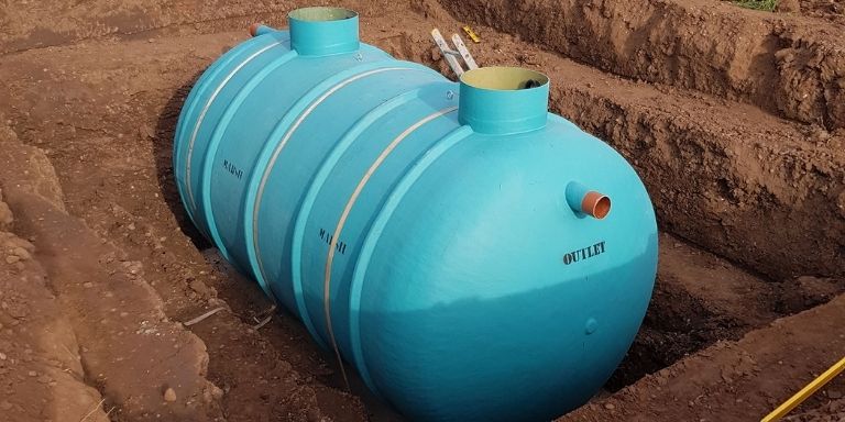 how much does it cost to pump a septic tank