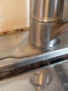 how to seal kitchen faucet base