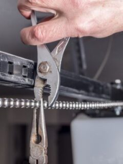 How to Tighten a Loose Sagging Garage Door Chain